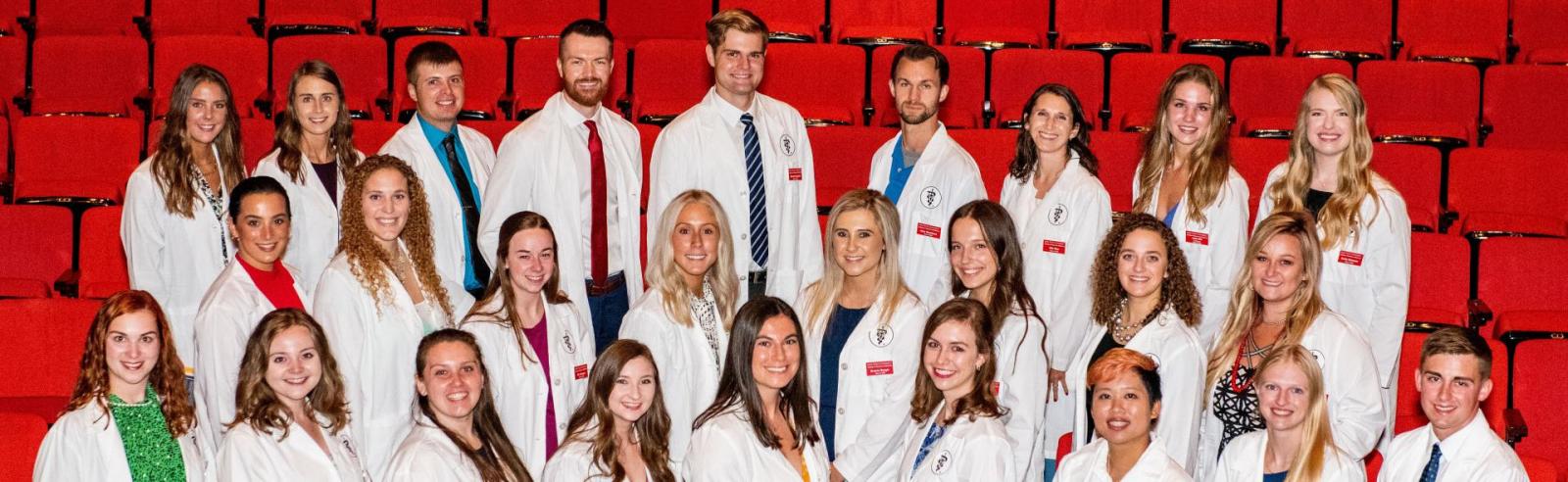Group picture of members of Class of 2025 at White Coat Ceremony